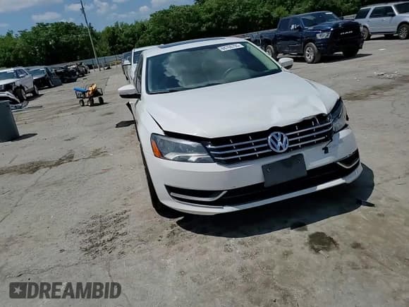 ✅ 2013 Volkswagen Passat SEL • VIN: 1VWCH7A38DC002698 • Lot: 68760795. Listed on Copart with 204,275 mi. Free auction sales archive from the USA and detailed vehicle history report at DreamBid. Image 13.