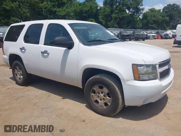 2011 Chevrolet Tahoe Commercial with VIN 1GNSK2E05BR372771, listed as a IAAI auction lot 42840332 with 170,734 mi miles and . Bid and sale history available at DreamBid. Image 1.