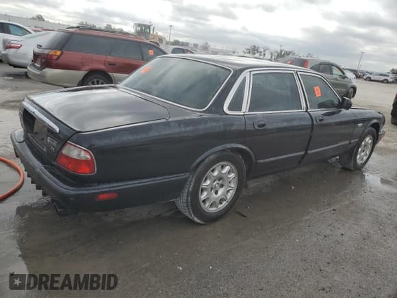 ✅ 2003 Jaguar XJ 8 • VIN: SAJDA14C93LF51026 • Лот: 83897794. Опубликован ранее на Copart с пробегом 50 945 миль. Бесплатный доступ к архиву аукционных продаж из США и подробный отчёт об истории автомобиля на DreamBid. Изображение 3.