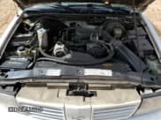 ✅ 1999 Oldsmobile Bravada • VIN: 1GHDT13W0X2722303 • Lot: 47444235. Wystawiony na Copart z przebiegiem 195 083 mil. Bezpłatny archiwum sprzedaży aukcyjnych z USA i szczegółowy raport historii pojazdu na DreamBid. Zdjęcie 14.