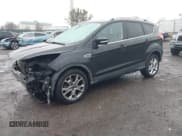 ✅ 2015 Ford Escape Titanium • VIN: 1FMCU9J9XFUB77087 • Lot: 43771373. Listed on IAAI with 95,650 mi. Free auction sales archive from the USA and detailed vehicle history report at DreamBid. Image 17.