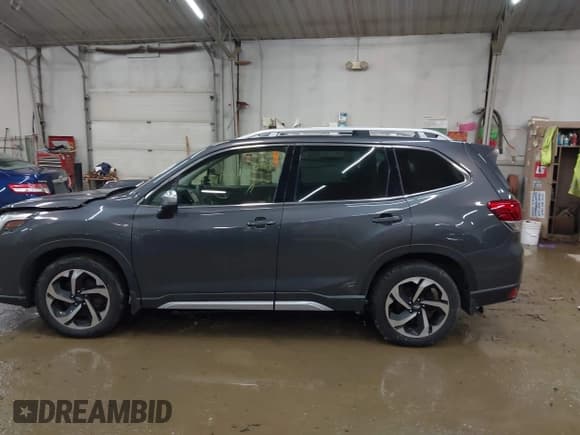 ✅ 2023 Subaru Forester Touring • VIN: JF2SKARC2PH550500 • Lot: 43712716. Listed on IAAI with 32,221 mi. Free auction sales archive from the USA and detailed vehicle history report at DreamBid. Image 14.