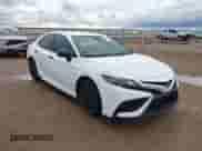 2022 Toyota Camry SE with VIN 4T1G11AK9NU062249, listed as a IAAI auction lot 40759861 with 54,753 mi miles and . Bid and sale history available at DreamBid. Image 1.