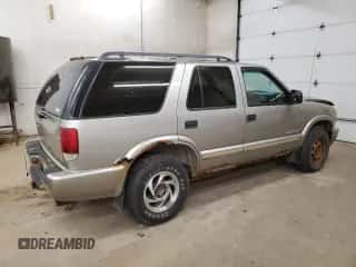 2004 Chevrolet Blazer LS z VIN 1GNDT13X04K101564, wystawiony jako Copart lot #80160164 z przebiegiem 249 187 mil mil oraz Szkoda całkowita • Salvage title. Historia ofert i sprzedaży dostępna na DreamBid. Obrazek 3.