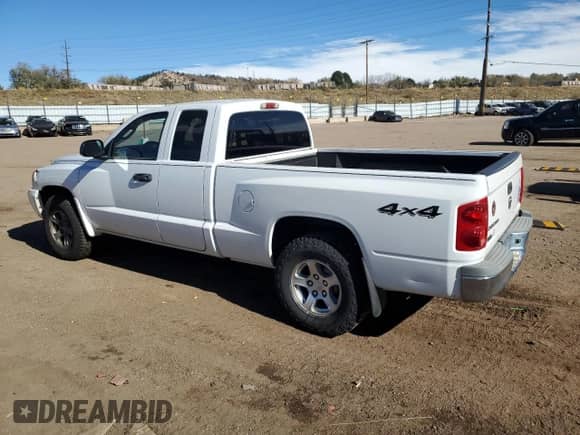 2006 Dodge Dakota SLT with VIN 1D7HW42K86S609668, listed as a Copart auction lot 80587354 with 238,688 mi miles and Salvage title. Bid and sale history available at DreamBid. Image 2.