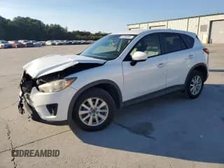 ✅ 2014 Mazda CX-5 Touring • VIN: JM3KE2CY1E0327349 • Lot: 87395585. Wystawiony na Copart z przebiegiem 165 676 mil. Bezpłatny archiwum sprzedaży aukcyjnych z USA i szczegółowy raport historii pojazdu na DreamBid. Zdjęcie 1.