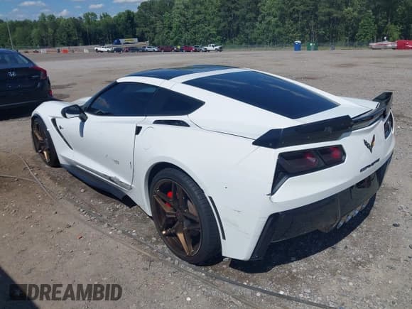 ✅ 2014 Chevrolet Corvette Z51 3LT • VIN: 1G1YM2D71E5116935 • Lot: 42341161. Listed on IAAI with 105,686 mi. Free auction sales archive from the USA and detailed vehicle history report at DreamBid. Image 3.