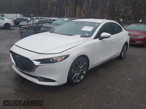 ✅ 2021 Mazda 3 Select • VIN: JM1BPABL4M1319578 • Лот: 43771777. Опубликован ранее на IAAI с пробегом 83 317 миль. Бесплатный доступ к архиву аукционных продаж из США и подробный отчёт об истории автомобиля на DreamBid. Изображение 2.