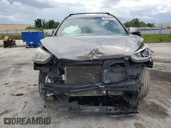 2017 Hyundai Santa Fe 2.0T с VIN 5XYZU4LA0HG493546, выставлен на аукционе Copart как лот 65222065 с пробегом 150 974 миль миль и Списание • Salvage title. История ставок и продаж доступна на DreamBid. Изображение 5.