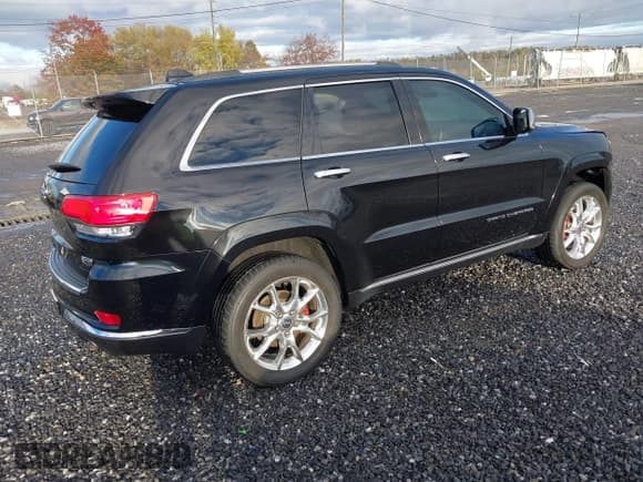 ✅ 2014 Jeep Grand Cherokee Summit • VIN: 1C4RJFJT6EC389037 • Lot: 43547372. Listed on IAAI with 152,933 mi. Free auction sales archive from the USA and detailed vehicle history report at DreamBid. Image 4.