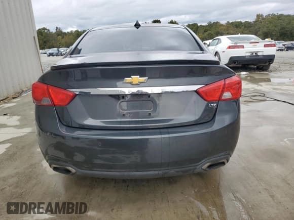 ✅ 2014 Chevrolet Impala LTZ • VIN: 1G1155S37EU126004 • Lot: 90404375. Listed on Copart with 203,095 mi. Free auction sales archive from the USA and detailed vehicle history report at DreamBid. Image 6.