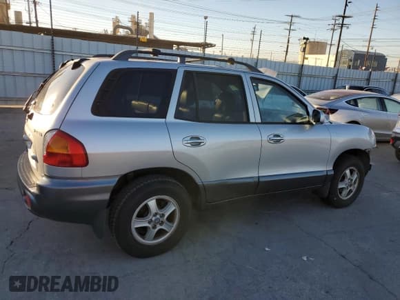 ✅ 2001 Hyundai Santa Fe GLS • VIN: KM8SC83D81U116159 • Лот: 87457485. Опубликован ранее на Copart с пробегом 130 440 миль. Бесплатный доступ к архиву аукционных продаж из США и подробный отчёт об истории автомобиля на DreamBid. Изображение 3.