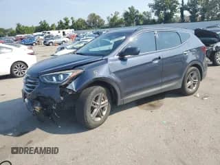 2017 Hyundai Santa Fe 2.4L z VIN 5NMZU3LBXHH009830, wystawiony jako Copart lot #69410825 z przebiegiem 94 847 mil mil oraz Szkoda całkowita • Salvage title. Historia ofert i sprzedaży dostępna na DreamBid. Obrazek 1.