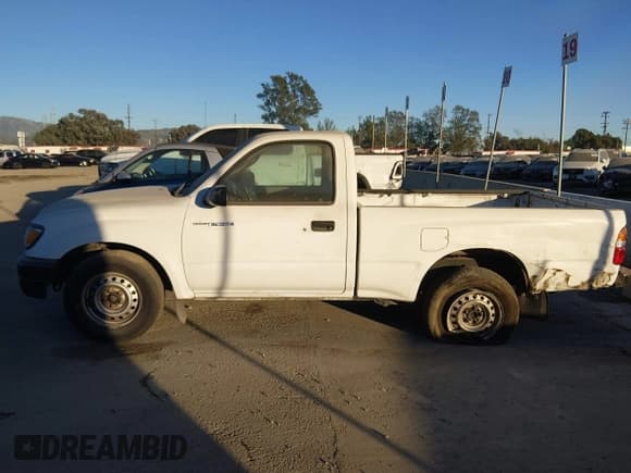 ✅ 2004 Toyota Tacoma • VIN: 5TENL42N04Z394070 • Lot: 43721735. Listed on IAAI with 572,363 mi. Free auction sales archive from the USA and detailed vehicle history report at DreamBid. Image 14.