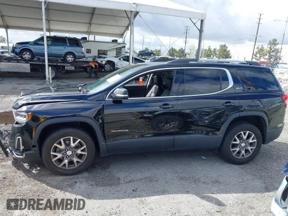 ✅ 2020 GMC Acadia SLT • VIN: 1GKKNMLS2LZ212286 • Lot: 41743656. Wystawiony na IAAI z przebiegiem 56 597 mil. Bezpłatny archiwum sprzedaży aukcyjnych z USA i szczegółowy raport historii pojazdu na DreamBid. Zdjęcie 14.