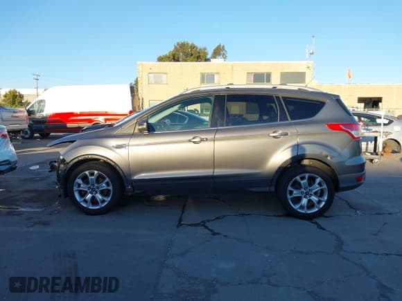 ✅ 2014 Ford Escape Titanium • VIN: 1FMCU0J90EUD17965 • Лот: 43598501. Опубликован ранее на IAAI с пробегом 123 145 миль. Бесплатный доступ к архиву аукционных продаж из США и подробный отчёт об истории автомобиля на DreamBid. Изображение 15.