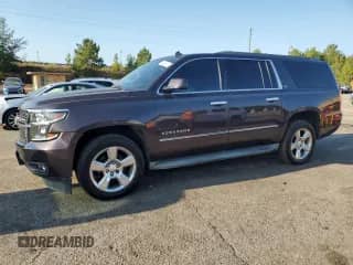 2015 Chevrolet Suburban LT with VIN 1GNSKJKC3FR123965, listed as a Copart auction lot 80460945 with 234,571 mi miles and Clean title. Bid and sale history available at DreamBid. Image 1.
