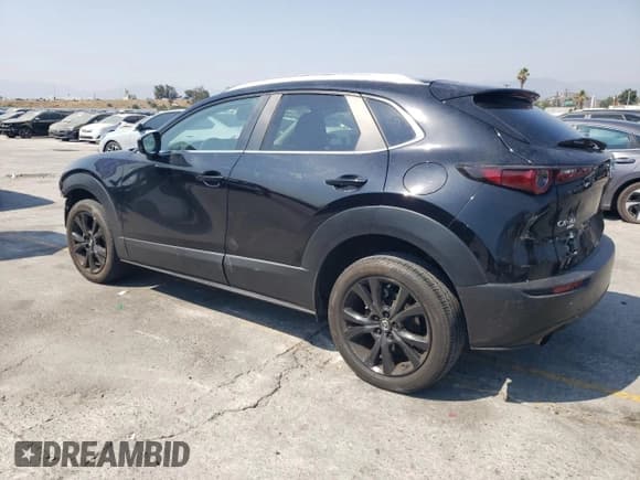 ✅ 2022 Mazda CX-30 2.5 Turbo • VIN: 3MVDMBAY6NM437882 • Lot: 64588415. Listed on Copart with 27,154 mi. Free auction sales archive from the USA and detailed vehicle history report at DreamBid. Image 2.