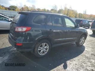 ✅ 2012 Hyundai Santa Fe SE • VIN: 5XYZHDAG7CG128091 • Лот: 89671475. Опубликован ранее на Copart с пробегом 239 027 миль. Бесплатный доступ к архиву аукционных продаж из США и подробный отчёт об истории автомобиля на DreamBid. Изображение 3.