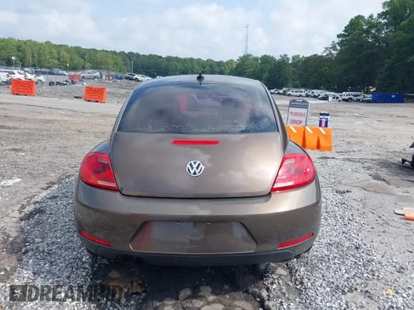 ✅ 2014 Volkswagen Beetle 1.8T • VIN: 3VWJ07AT2EM664064 • Lot: 43036687. Listed on IAAI with 112,000 mi. Free auction sales archive from the USA and detailed vehicle history report at DreamBid. Image 17.