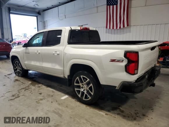 ✅ 2023 Chevrolet Colorado 4WD Z71 • VIN: 1GCPTDEK2P1267166 • Lot: 90399015. Listed on Copart with 24,743 mi. Free auction sales archive from the USA and detailed vehicle history report at DreamBid. Image 2.