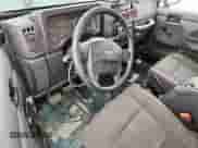 2005 Jeep Wrangler X с VIN 1J4FA39S35P333959, выставлен на аукционе Copart как лот 59576665 с пробегом 261 856 миль миль и Списание • Salvage title. История ставок и продаж доступна на DreamBid. Изображение 8.