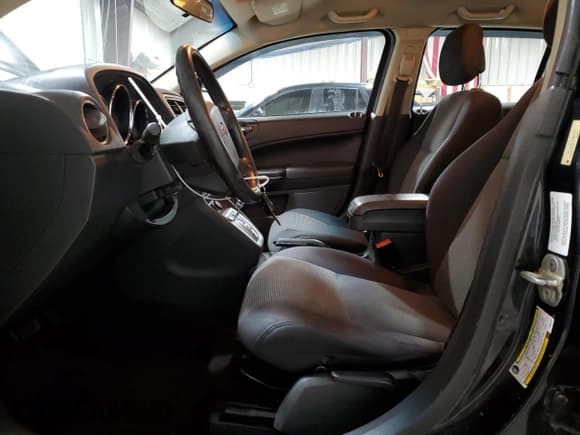 ✅ 2010 Dodge Caliber SXT • VIN: 1B3CB4HA1AD662757 • Lot: 81899934. Wystawiony na Copart z przebiegiem 128 801 mil. Bezpłatny archiwum sprzedaży aukcyjnych z USA i szczegółowy raport historii pojazdu na DreamBid. Zdjęcie 7.