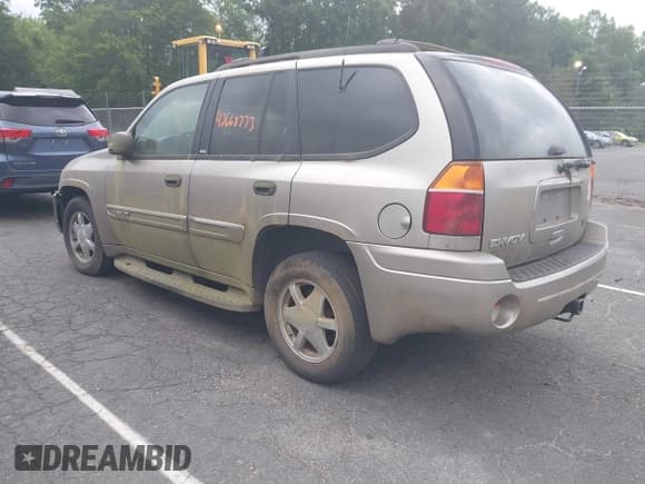 ✅ 2002 GMC Envoy SLT • VIN: 1GKDT13S022283765 • Lot: 42668763. Wystawiony na IAAI z przebiegiem 198 711 mil. Bezpłatny archiwum sprzedaży aukcyjnych z USA i szczegółowy raport historii pojazdu na DreamBid. Zdjęcie 3.