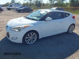 2012 Hyundai Veloster w/Red Int с VIN KMHTC6AD6CU028161, выставлен на аукционе IAAI как лот 43564329 с пробегом 98 673 миль миль и . История ставок и продаж доступна на DreamBid. Изображение 2.