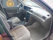 ✅ 1999 Toyota Camry LE • VIN: 4T1BG28K0XU595551 • Lot: 43170150. Wystawiony na IAAI z przebiegiem 157 031 mil. Bezpłatny archiwum sprzedaży aukcyjnych z USA i szczegółowy raport historii pojazdu na DreamBid. Zdjęcie 5.