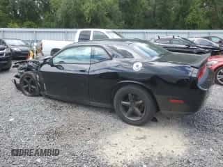 2013 Dodge Challenger SXT z VIN 2C3CDYAG5DH569623, wystawiony jako Copart lot #69090204 z przebiegiem 178 646 mil mil oraz Szkoda całkowita • Salvage title. Historia ofert i sprzedaży dostępna na DreamBid. Obrazek 2.
