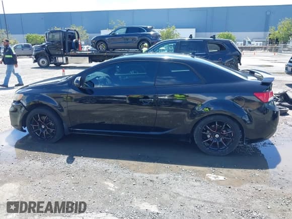 ✅ 2013 Kia Forte SX • VIN: KNAFW6A37D5693014 • Lot: 42245132. Listed on IAAI with 144,904 mi. Free auction sales archive from the USA and detailed vehicle history report at DreamBid. Image 14.