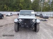 ✅ 2023 Jeep Wrangler Sahara • VIN: 1C4HJXEG5PW511502 • Lot: 43383510. Listed on IAAI with 24,169 mi. Free auction sales archive from the USA and detailed vehicle history report at DreamBid. Image 13.