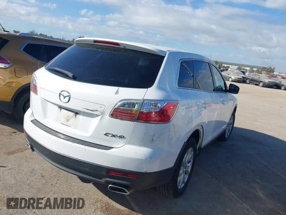 ✅ 2012 Mazda CX-9 Sport • VIN: JM3TB2BA5C0337087 • Lot: 43684686. Listed on IAAI with 192,560 mi. Free auction sales archive from the USA and detailed vehicle history report at DreamBid. Image 4.