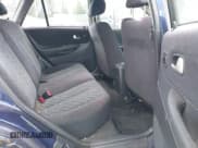 ✅ 2003 Mazda Protege • VIN: JM1BJ245031117566 • Lot: 42349853. Wystawiony na IAAI z przebiegiem 152 784 mil. Bezpłatny archiwum sprzedaży aukcyjnych z USA i szczegółowy raport historii pojazdu na DreamBid. Zdjęcie 8.