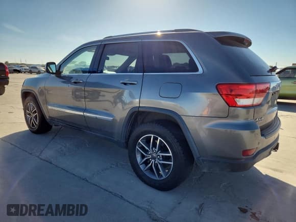 ✅ 2013 Jeep Grand Cherokee Laredo • VIN: 1C4RJFAG8DC529042 • Lot: 82599485. Listed on Copart with 119,884 mi. Free auction sales archive from the USA and detailed vehicle history report at DreamBid. Image 2.