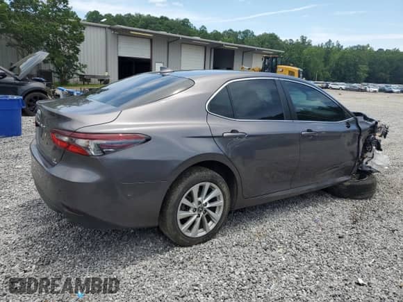 2023 Toyota Camry LE с VIN 4T1C11BK1PU102890, выставлен на аукционе Copart как лот 62864095 с пробегом 67 528 миль миль и Списание • Salvage title. История ставок и продаж доступна на DreamBid. Изображение 3.