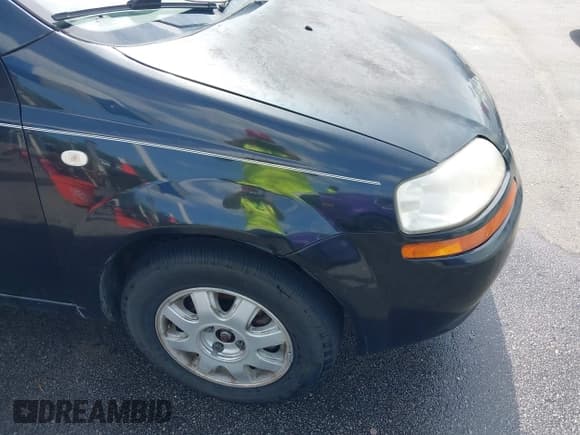 ✅ 2005 Chevrolet Aveo LS • VIN: KL1TD52685B481277 • Lot: 42165358. Listed on IAAI with 247,940 mi. Free auction sales archive from the USA and detailed vehicle history report at DreamBid. Image 12.