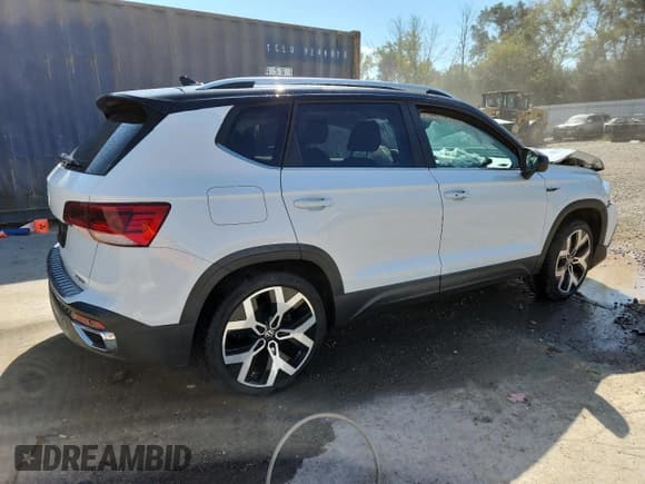 ✅ 2023 Volkswagen Taos SEL • VIN: 3VV2X7B21PM340293 • Lot: 71027865. Listed on Copart with 29,991 mi. Free auction sales archive from the USA and detailed vehicle history report at DreamBid. Image 3.