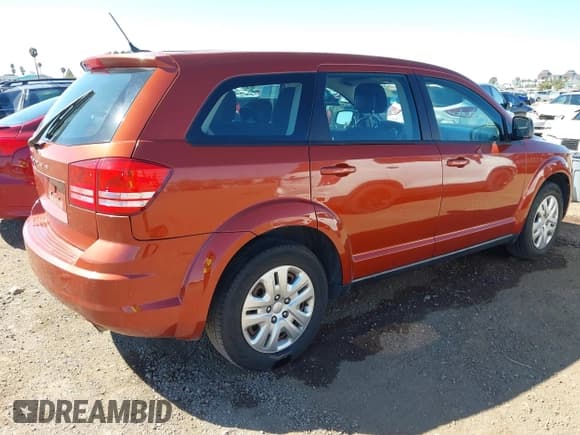 ✅ 2014 Dodge Journey SE • VIN: 3C4PDCAB2ET256638 • Lot: 43323260. Listed on IAAI with 84,994 mi. Free auction sales archive from the USA and detailed vehicle history report at DreamBid. Image 4.