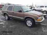 2000 Chevrolet Blazer LT with VIN 1GNDT13W1YK162399, listed as a IAAI auction lot 41461888 with 152,028 mi miles and . Bid and sale history available at DreamBid. Image 1.