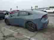 2024 Toyota Prius LE z VIN JTDACAAUXR3046059, wystawiony jako Copart lot #82167085 z przebiegiem 2 675 mil mil oraz Szkoda całkowita • Salvage title. Historia ofert i sprzedaży dostępna na DreamBid. Obrazek 2.