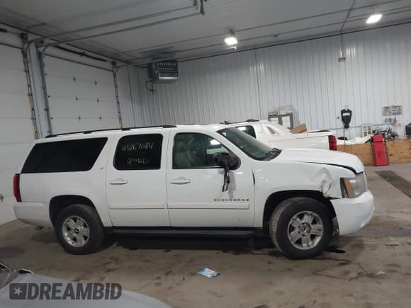 ✅ 2007 Chevrolet Suburban LT • VIN: 1GNFK16397J300658 • Lot: 43267084. Listed on IAAI with 201,521 mi. Free auction sales archive from the USA and detailed vehicle history report at DreamBid. Image 13.