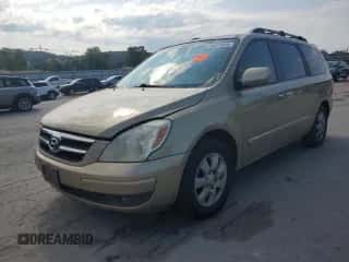 2007 Hyundai Entourage GLS z VIN KNDMC233976028851, wystawiony jako Copart lot #80674005 z przebiegiem 128 049 mil mil oraz Czysty tytuł • Clean title. Historia ofert i sprzedaży dostępna na DreamBid. Obrazek 1.