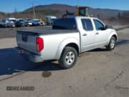 ✅ 2013 Nissan Frontier SL • VIN: 1N6AD0EV0DN731594 • Lot: 41702767. Listed on IAAI with 101,611 mi. Free auction sales archive from the USA and detailed vehicle history report at DreamBid. Image 4.