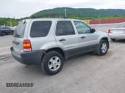 ✅ 2003 Ford Escape XLT Popular 2 • VIN: 1FMYU93193KC76018 • Lot: 42355904. Listed on IAAI with 233,131 mi. Free auction sales archive from the USA and detailed vehicle history report at DreamBid. Image 4.