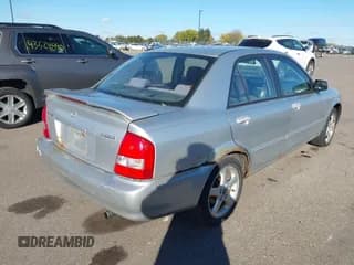 ✅ 2002 Mazda Protege DX • VIN: JM1BJ226621561710 • Lot: 43508258. Wystawiony na IAAI z przebiegiem 202 896 mil. Bezpłatny archiwum sprzedaży aukcyjnych z USA i szczegółowy raport historii pojazdu na DreamBid. Zdjęcie 4.
