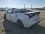 2021 Toyota Prius L Eco with VIN JTDKAMFU5M3127192, listed as a Copart auction lot 71626674 with 75,212 mi miles and Salvage title. Bid and sale history available at DreamBid. Image 2.