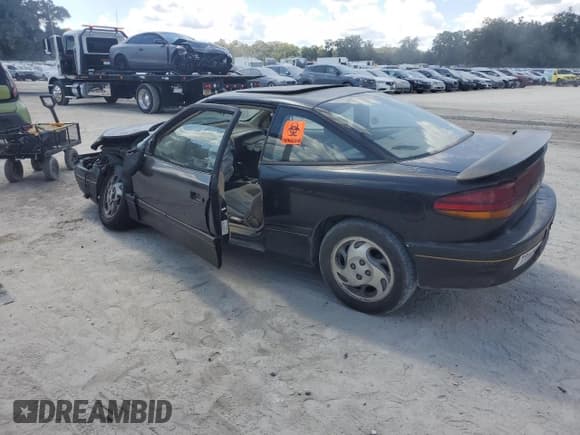 ✅ 1996 Saturn SC • VIN: 1G8ZG1278TZ130380 • Lot: 81802615. Listed on Copart with 281,707 mi. Free auction sales archive from the USA and detailed vehicle history report at DreamBid. Image 2.