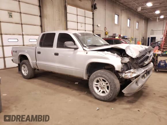 2004 Dodge Dakota Sport с VIN 1D7HG38N34S508009, выставлен на аукционе Copart как лот 42217205 с пробегом 168 446 миль миль и Списание • Salvage title. История ставок и продаж доступна на DreamBid. Изображение 4.
